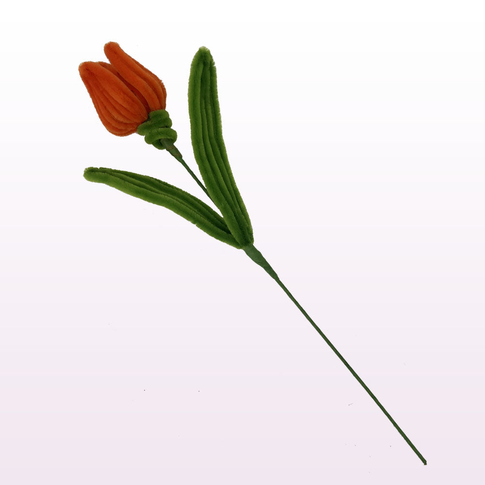 Artificial flower with orange bloom and green leaves